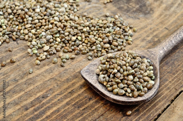 Obraz hemp seed in spoon on table
