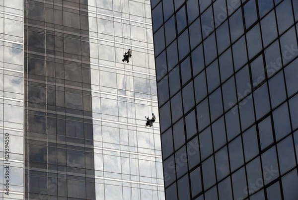 Fototapeta Window cleaners work on skyscraper