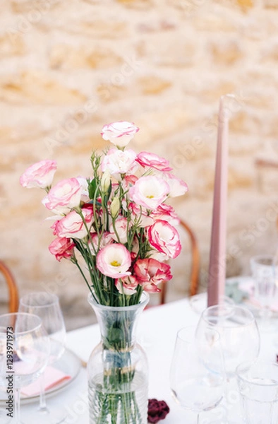 Obraz Beautiful bouquet with Eustoma flowers on table in bedroom. Space for text