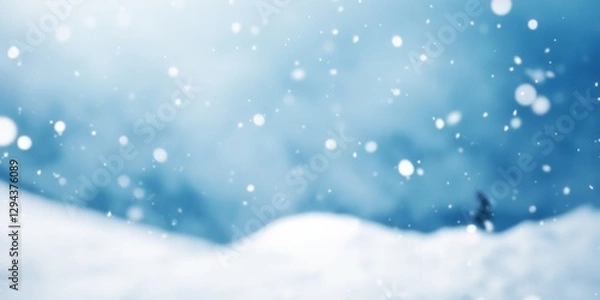 Fototapeta Snowy mountains covered in white winter blanket, snow particles falling down from the sky