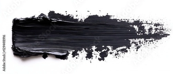 Fototapeta Dramatic black paint stroke on white background showcasing texture and depth for creative projects