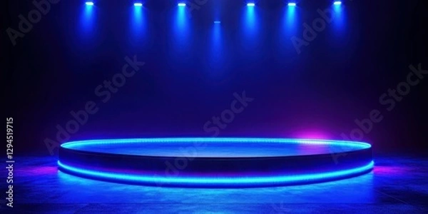 Fototapeta Brightly lit circular stage ready for performance in a modern venue at night
