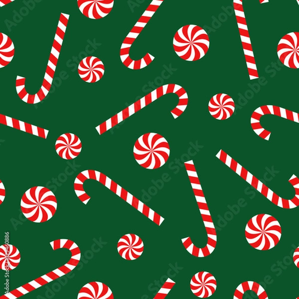 Fototapeta Candy cane and lollipop seamless christmas pattern on green background. Happy New Year and Merry Xmas background. Vector winter holidays print for textile, wallpaper, fabric, wallpaper.