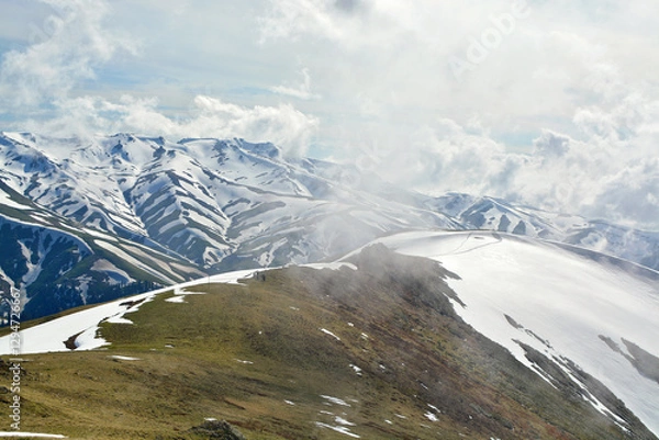Obraz mountain landscape with snow and clouds