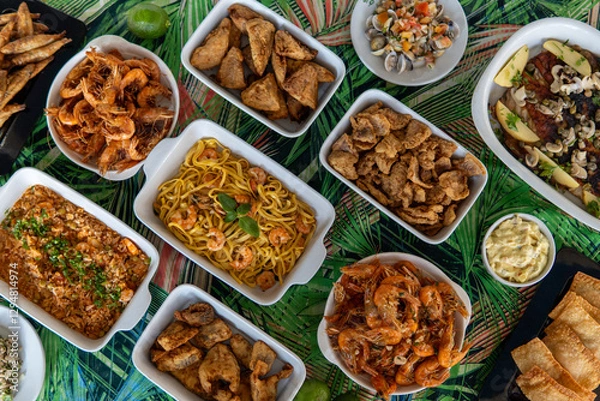 Fototapeta Seafood buffet with many choices of dishes in vibrant colors