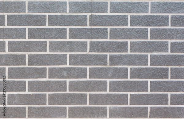 Fototapeta Gray brick wall is suitable for background.