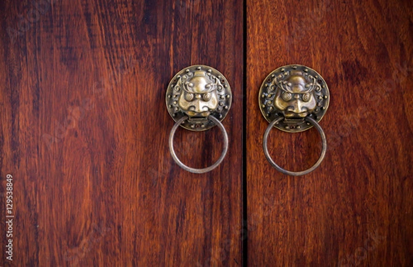 Obraz Close-up China style door handle on natural wooden door , select