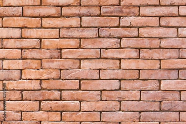 Obraz Brick wall background in orange color.