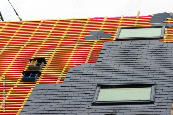 Fototapeta pose des tuiles