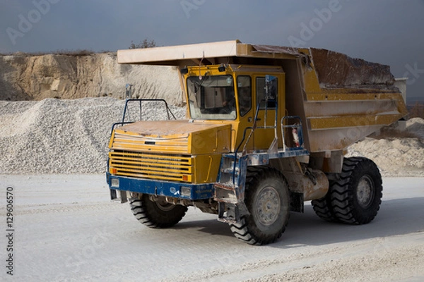 Obraz Moving dump truck full of chalk in quarry 