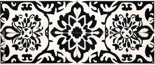 Fototapeta A black and white tile design with a flower pattern. The design is very intricate and detailed. The tile is placed on a white background