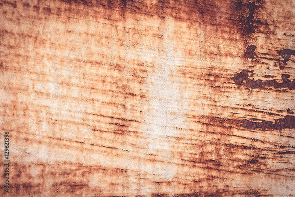 Fototapeta A background of peeling paint and rusty old metal