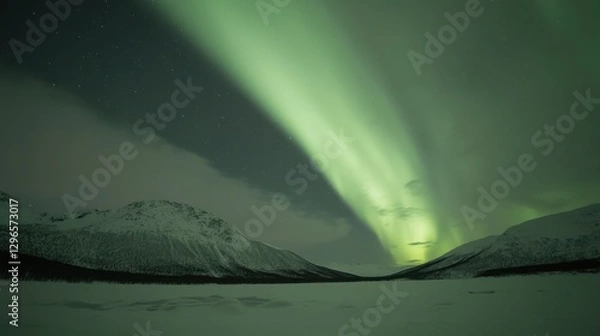 Fototapeta A stunning time-lapse style composition of the Aurora dancing across the sky,