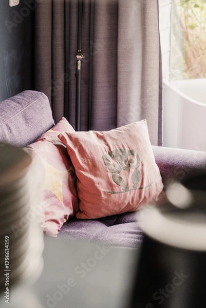 Obraz Colorful pillows on purple sofa, interior