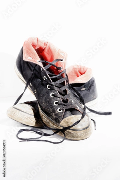 Fototapeta Old shoes on white background