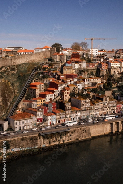 Fototapeta A breathtaking view of the bridge in Porto, Portugal, capturing the city’s charming mix of historic architecture