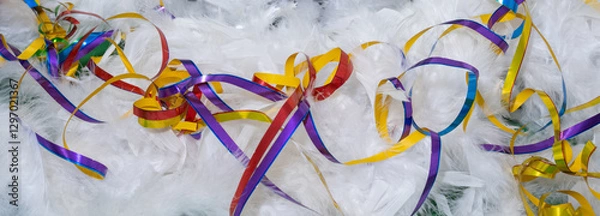 Obraz Colorful streamers on white feathers