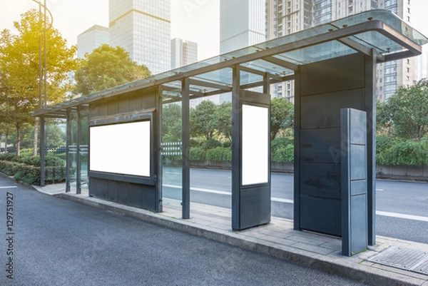 Obraz Blank advertising billboard at bus stop in city of China.