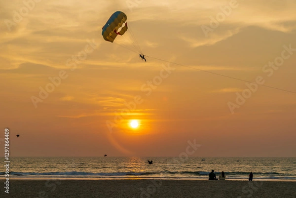 Obraz adventure sport with a setting sun