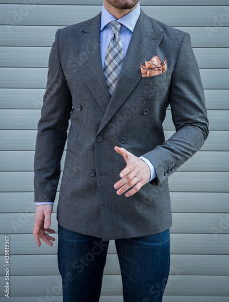 Obraz Male model posing in a grey torso jacket