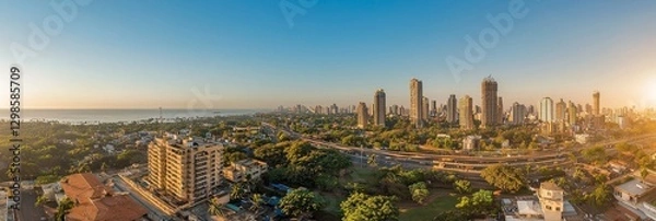 Fototapeta The areas of Wadala, Parel, and Dadar in midtown Mumbai are bathed in sunlight on a summer afternoon
