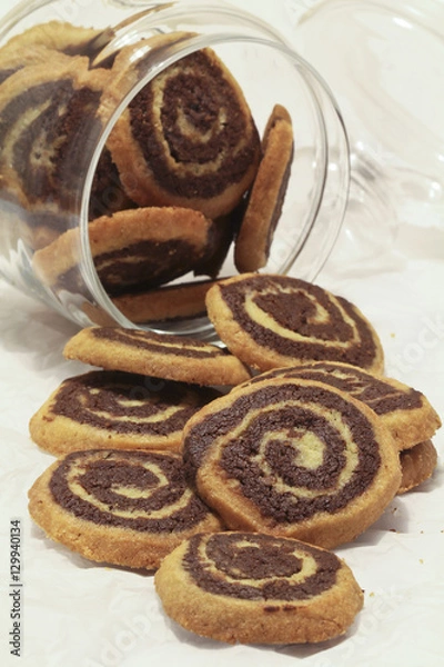 Obraz Chocolate Vanilla Swirl Cookies in Glass Jar