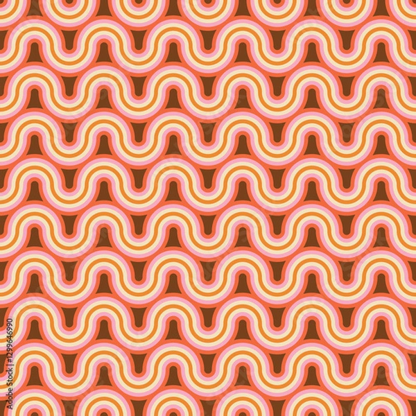 Fototapeta Retro waves in warm tones create a groovy, seamless pattern.  Brown, orange, and pink hues evoke a 70s vibe in this bold, repeating design.