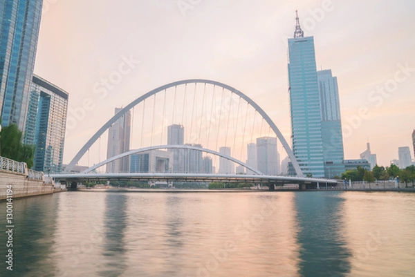 Obraz The urban architectural skyline, modern bridges, and Haihe River scenery of Tianjin, China on August 11, 2024