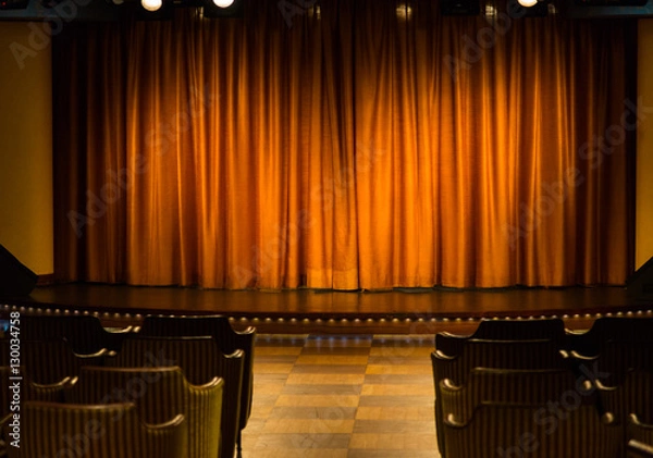 Obraz Small stage with orange curtains in cameral private cinema