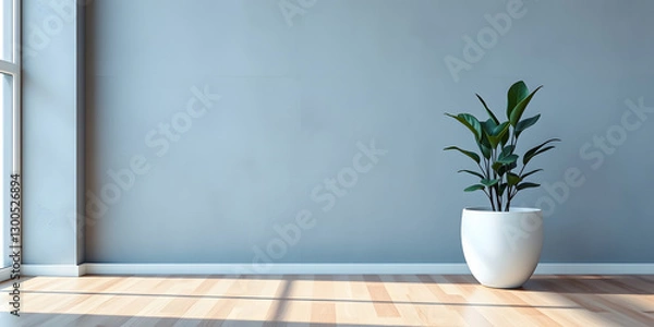 Fototapeta minimalist mockup of a white wall adorned with a vibrant green plant on a polished wood floor,split-color background wall creating a lively and cheerful atmosphere of modern interior design.