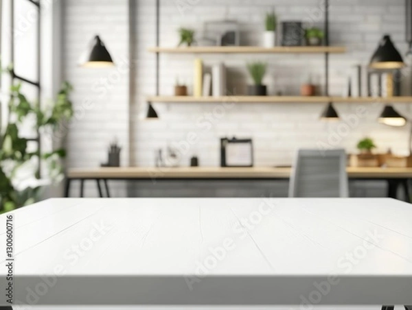 Fototapeta Sleek white rectangular wooden table with even lighting and blurred creative workspace background featuring shelves and desk lamps
