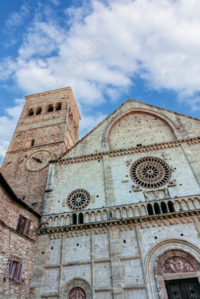 Fototapeta The Cathedral of Assisi, dedicated to San Rufino, is the main church in Assisi, Italy. Cathedral of San Rufino-majestic church in the Umbrian Romanesque style