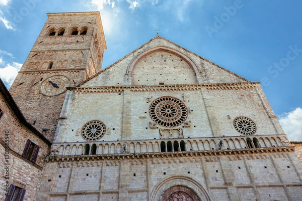 Fototapeta The Cathedral of Assisi, dedicated to San Rufino, is the main church in Assisi, Italy. Cathedral of San Rufino-majestic church in the Umbrian Romanesque style