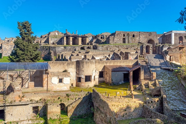 Fototapeta View of the main entrance to the historic city of Pompeii with the Marina Gate and the suburban baths adjacent to the ancient city walls.