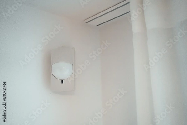 Fototapeta Wall Mounted Motion Sensor with Curtain