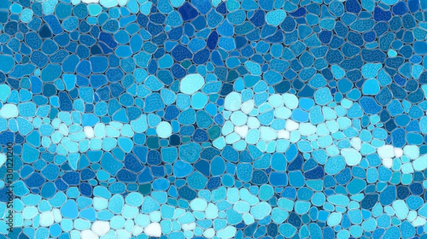 Fototapeta A seamless pattern of blue, aqua, and turquoise with a grainy texture resembling glass beads. The design evokes shallow ocean waves and smooth rocks, creating depth and movement in minimalist art styl
