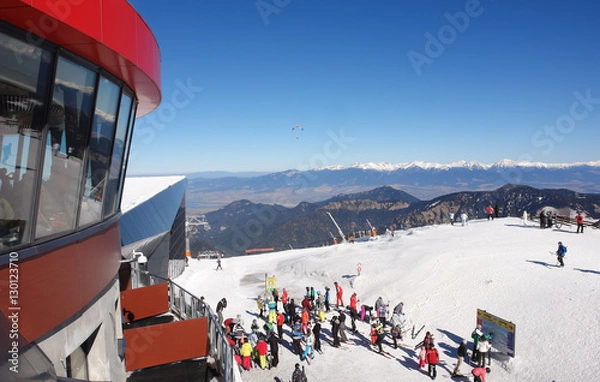 Fototapeta Skiers on the cable car station Chopok