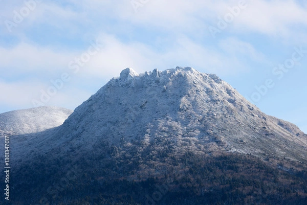Fototapeta View of Mendeleev volcan on winter. Kunashir. Southern Kurils