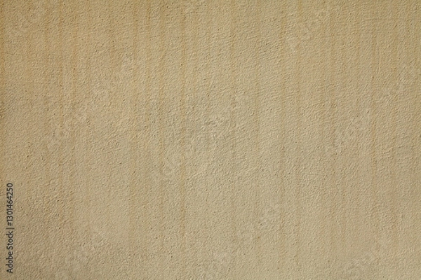 Obraz Texture and background of yellowed shade. The building wall, painted with beige water-based paint. Old surface in faded beige color with stains and strokes. The striped backdrop with streaks and drips