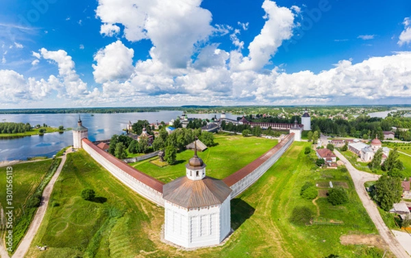 Fototapeta Aerial top view of ancient Kirillo Belozersky Monastery, fortress and lake Siverskoye on sunny summer day. Panoramic view to Church of the Transfiguration. Holy places, Kirillov, Vologda region Russia