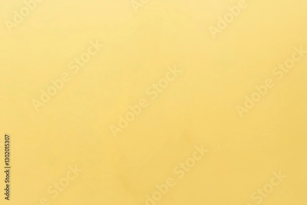 Fototapeta A plain background showcases an expansive and uniform yellow surface