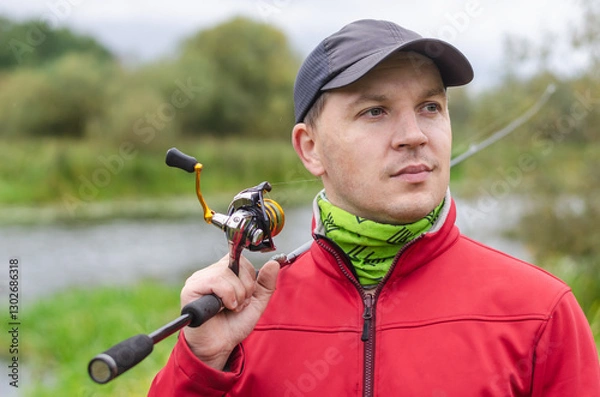 Obraz Portrait of Fisherman on the river bank.