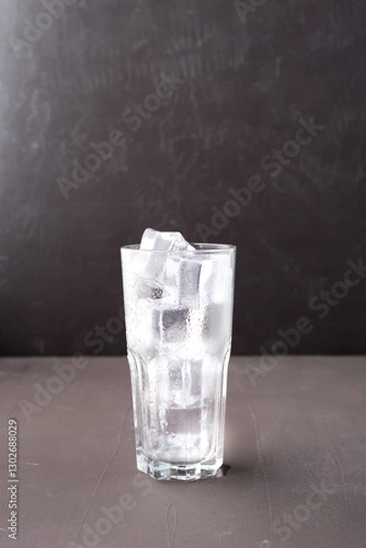 Obraz Clear glass with ice cubes..