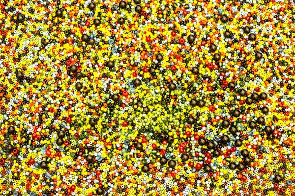 Obraz Colorful beads is scattered, close up, background