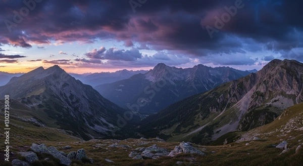 Fototapeta Dramatic mountain landscape with captivating clouds, providing ample copyspace