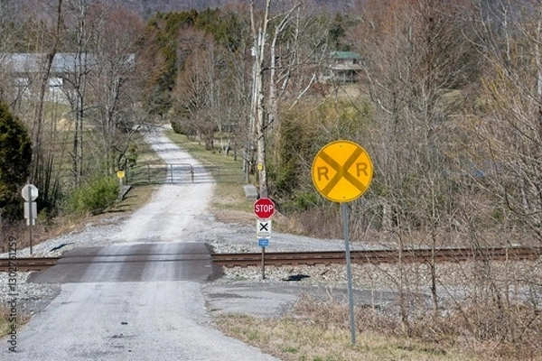 Fototapeta Faded railroad crossing sign at a private driveway