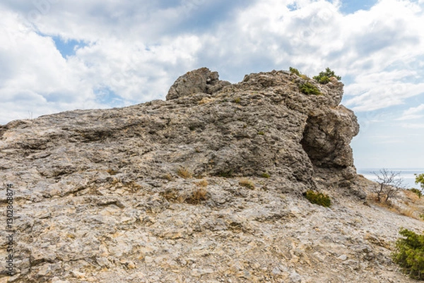 Obraz Rocks on the Golitsyn Trail is a mountain path cut into the slope of Mount Koba-Kaya, located along the coastline southwest of the village of Novy Svet, Crimea, Russia.