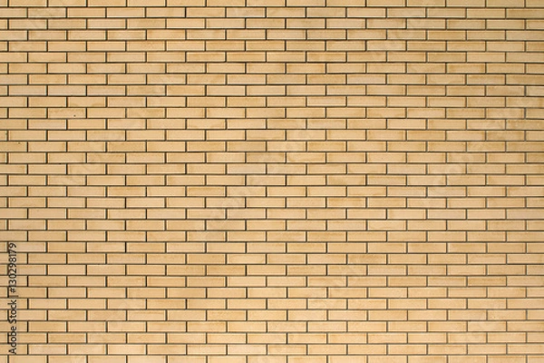 Obraz High resolution texture of a yellow brick wall. Laying horizonta