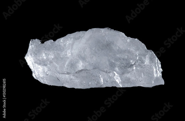 Fototapeta Natural uneven pieces of ice isolated on a black background.