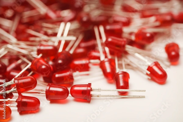 Obraz Red LED bulbs on a white background. The radio element is an LED lamp.